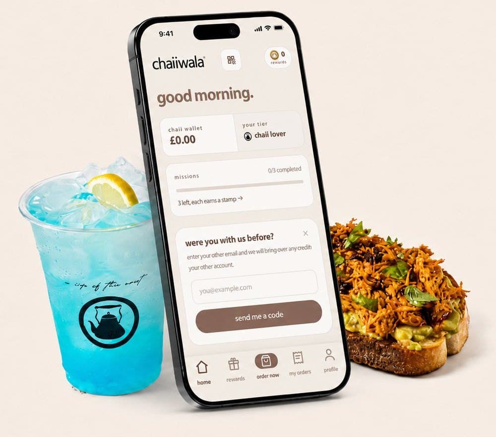 A blue chaiiwala iced drink, the rewards site on a phone and a slice of street food toast