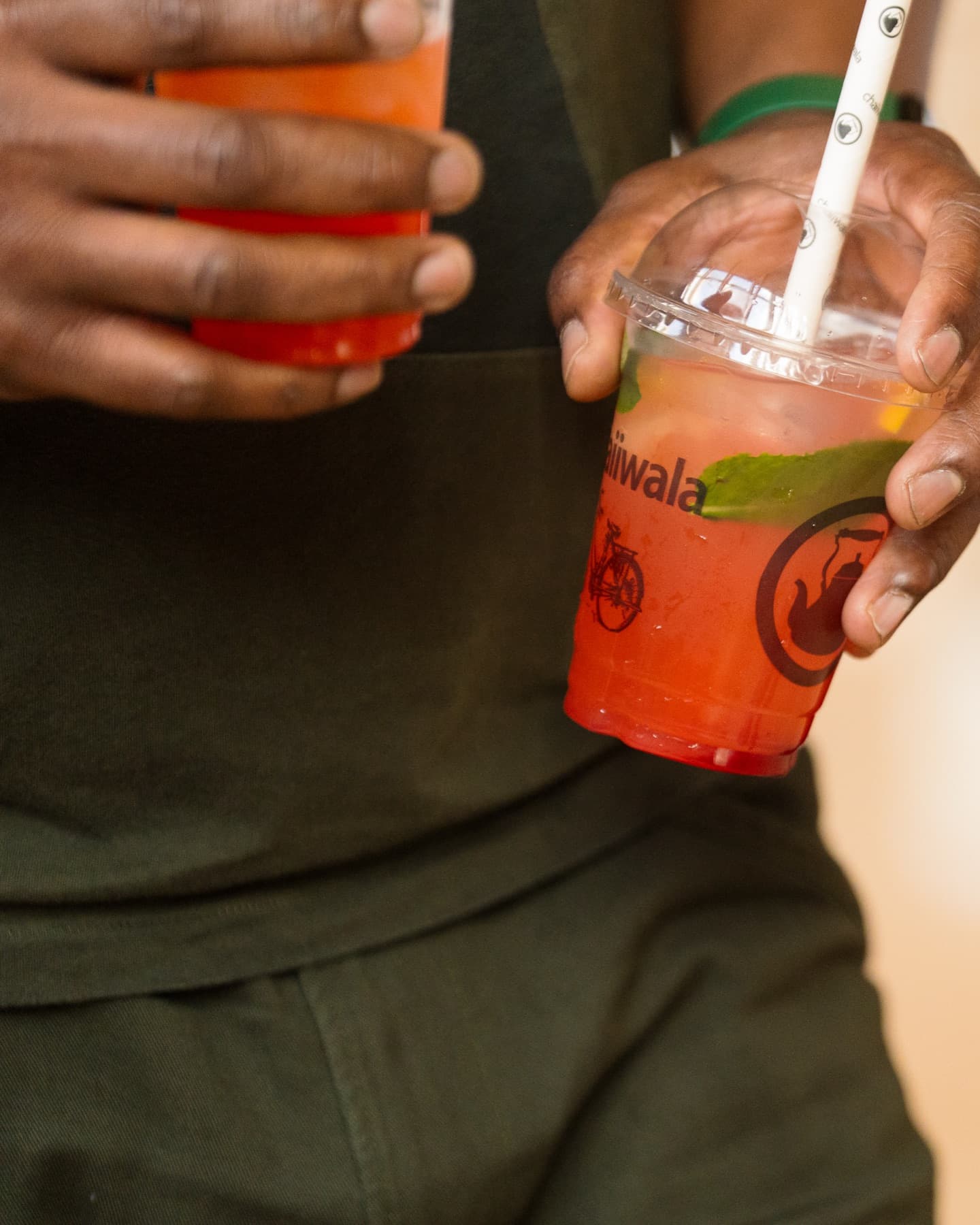 Karak chaii being poured into branded cups